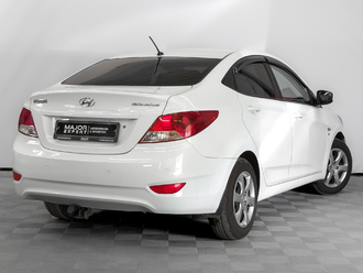 фото Hyundai Solaris I 2013